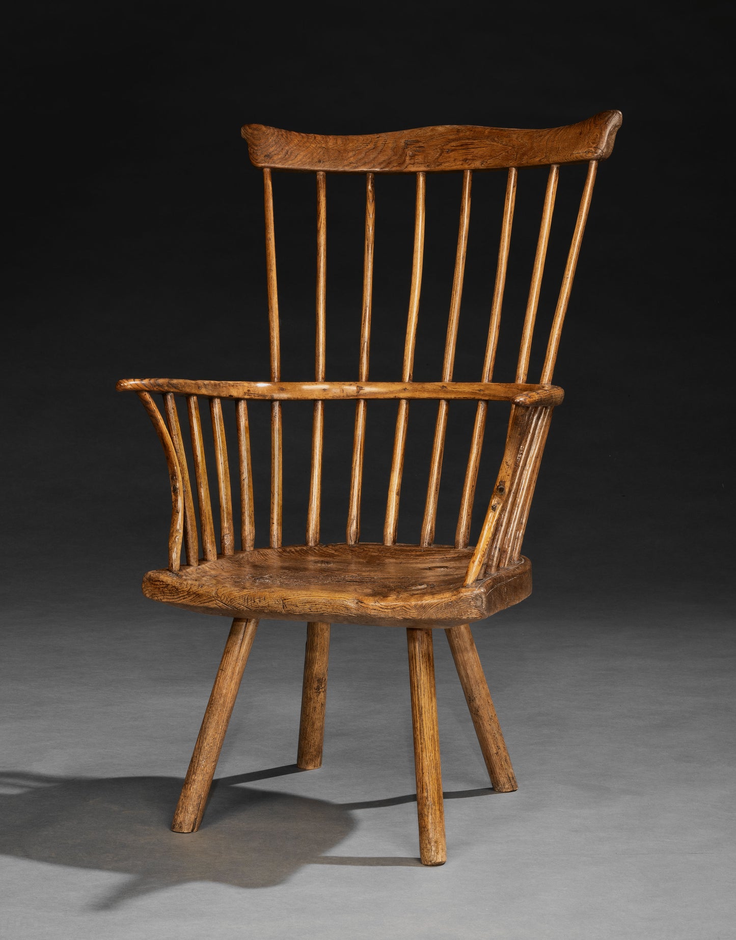 Spirited Primitive Windsor Stick and Comb Back Armchair