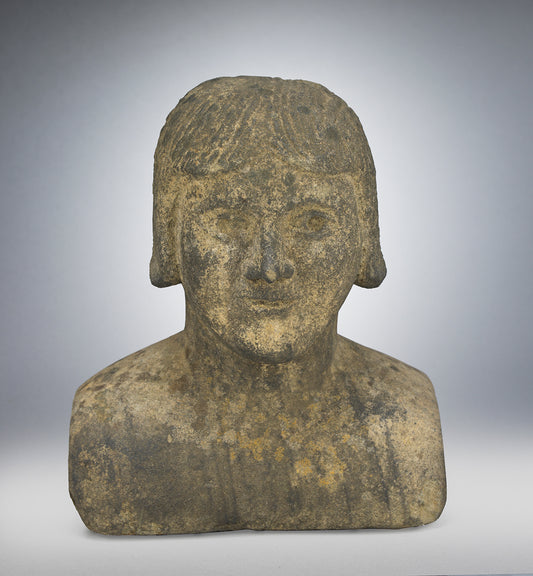 A Distinctive Primitive Carved Stone Portrait Bust