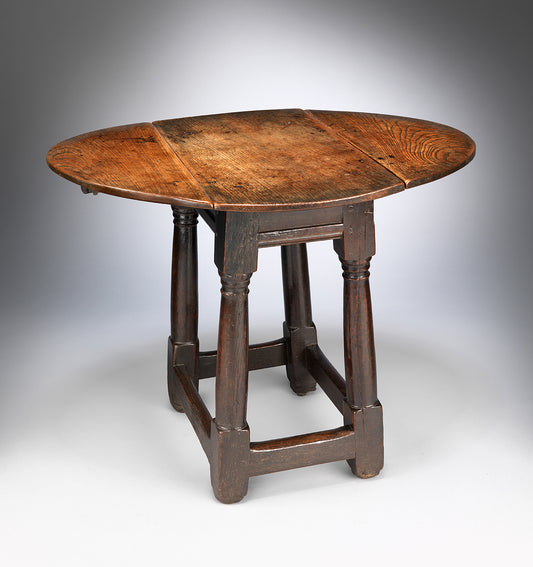 Notable Early Oval Drop Leaf Occasional Table