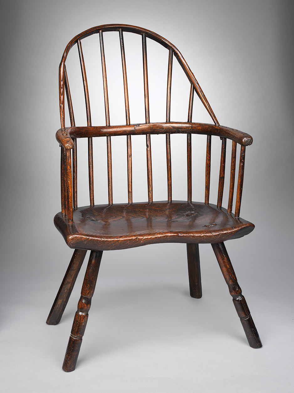 A Rare Primitive Bow Back Windsor Armchair