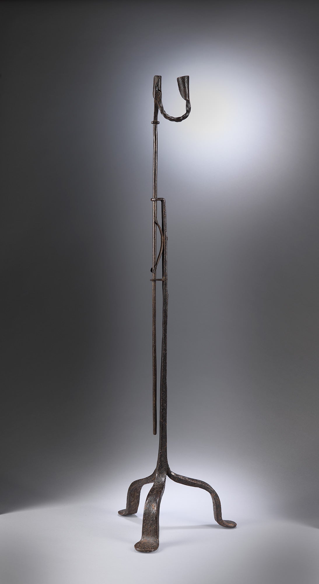 An Early Tripod Floor Standard Lighting Device