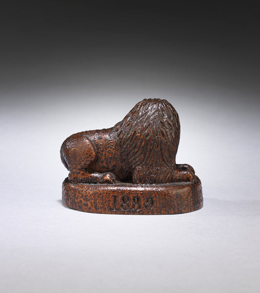 Whimsical Folk Art Sculpture of a Reclining Lion (Reverse)