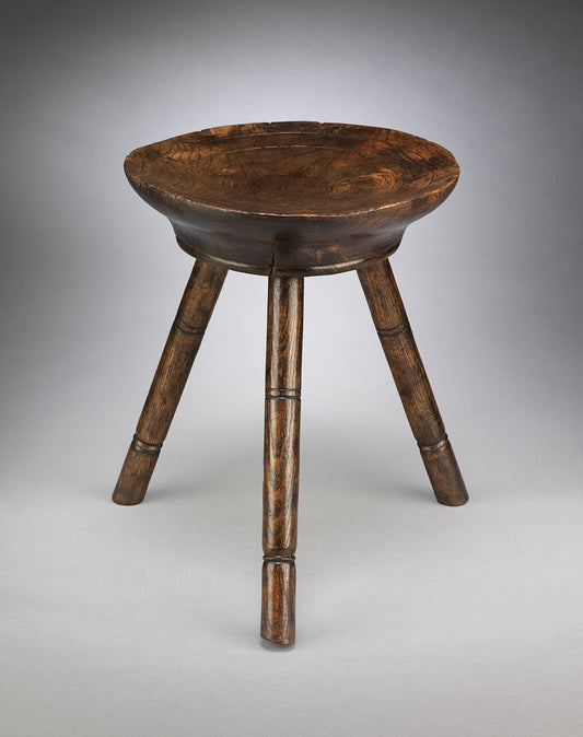 A Classic Three-Legged Dairy Stool