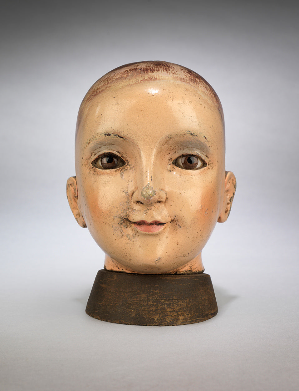 Rare and Finely Carved Early "Santos" Head