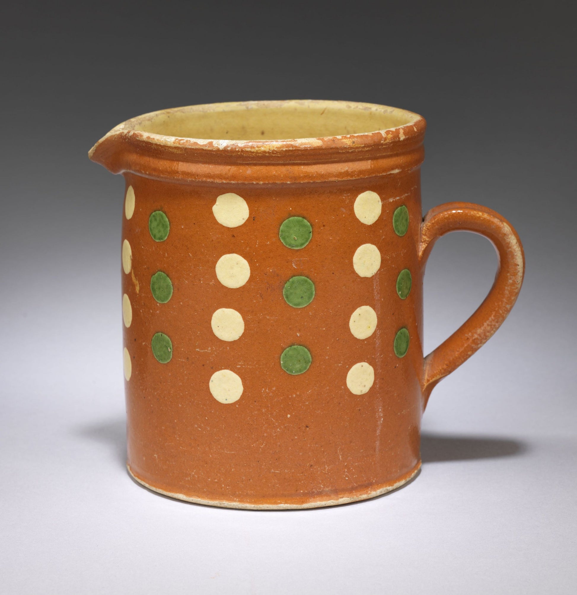 Cream and Green Spot  Decorated Slipware Jug