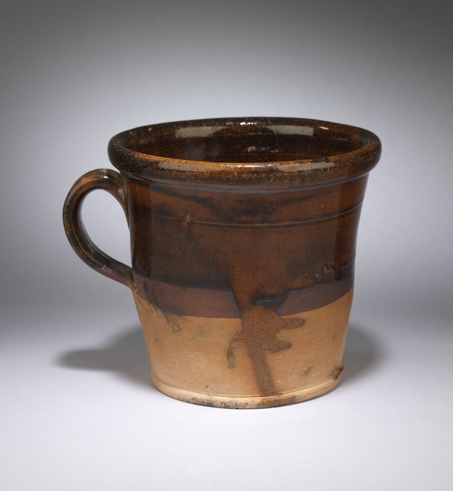 A Loop Handled Slipware Crock