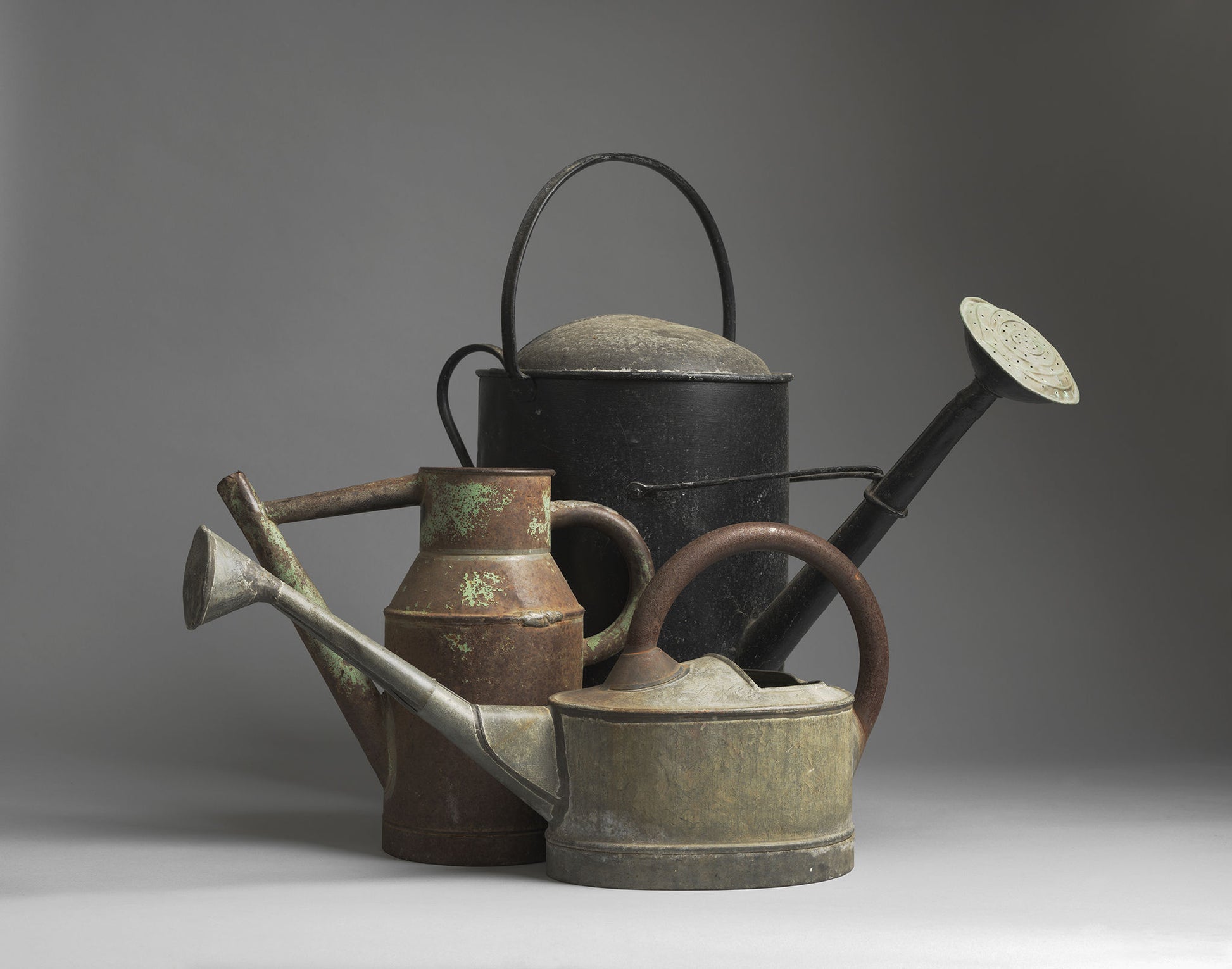 A Group of 3 Vintage Watering Cans