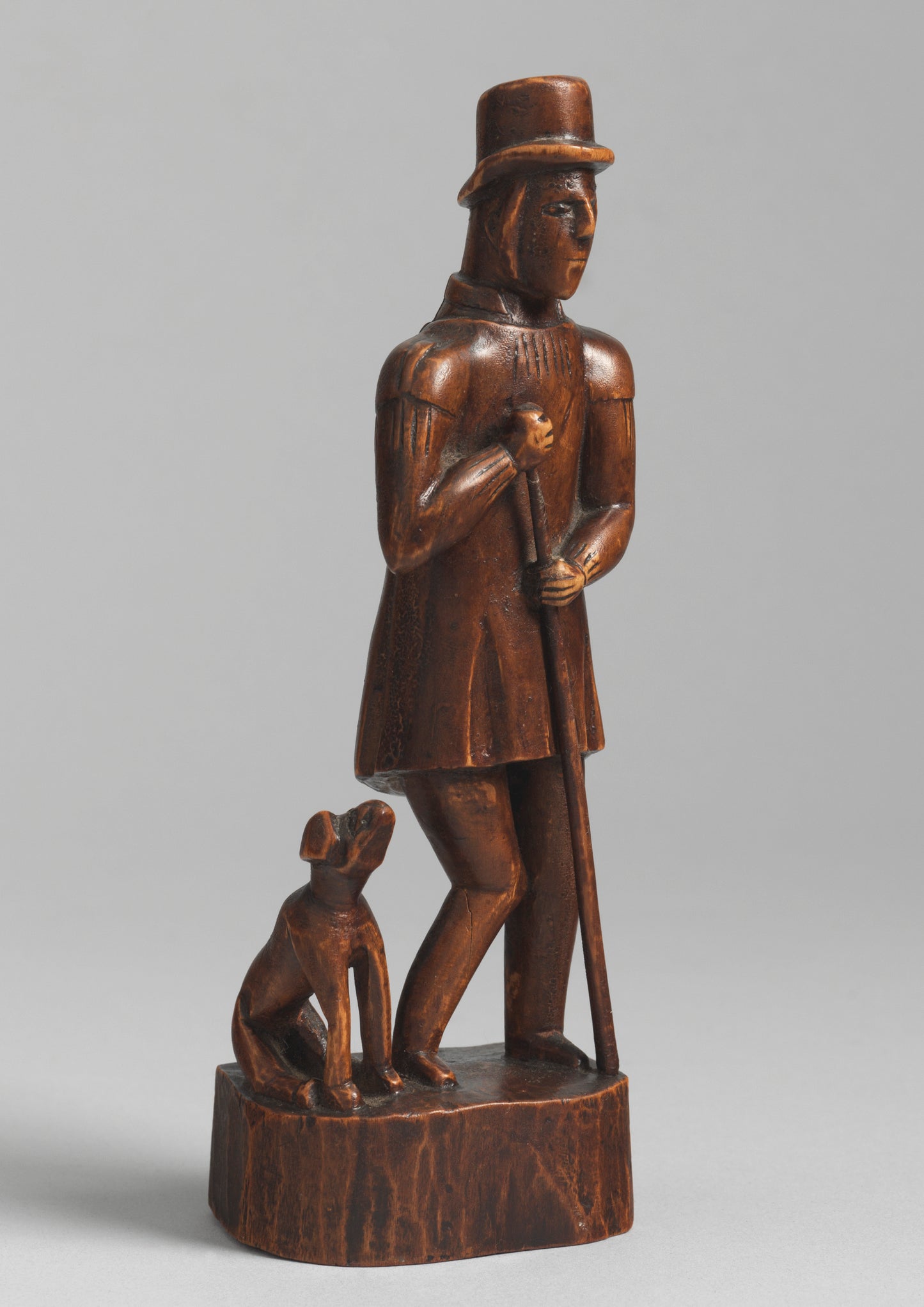 Folk Art Sculpture of A Shepherd and His Dog