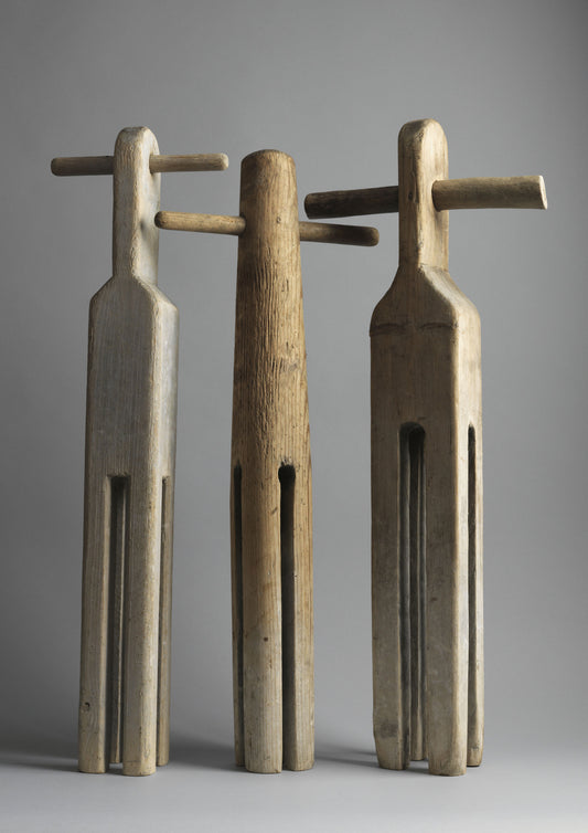 A Collection of Three Sculptural Washing Dollies