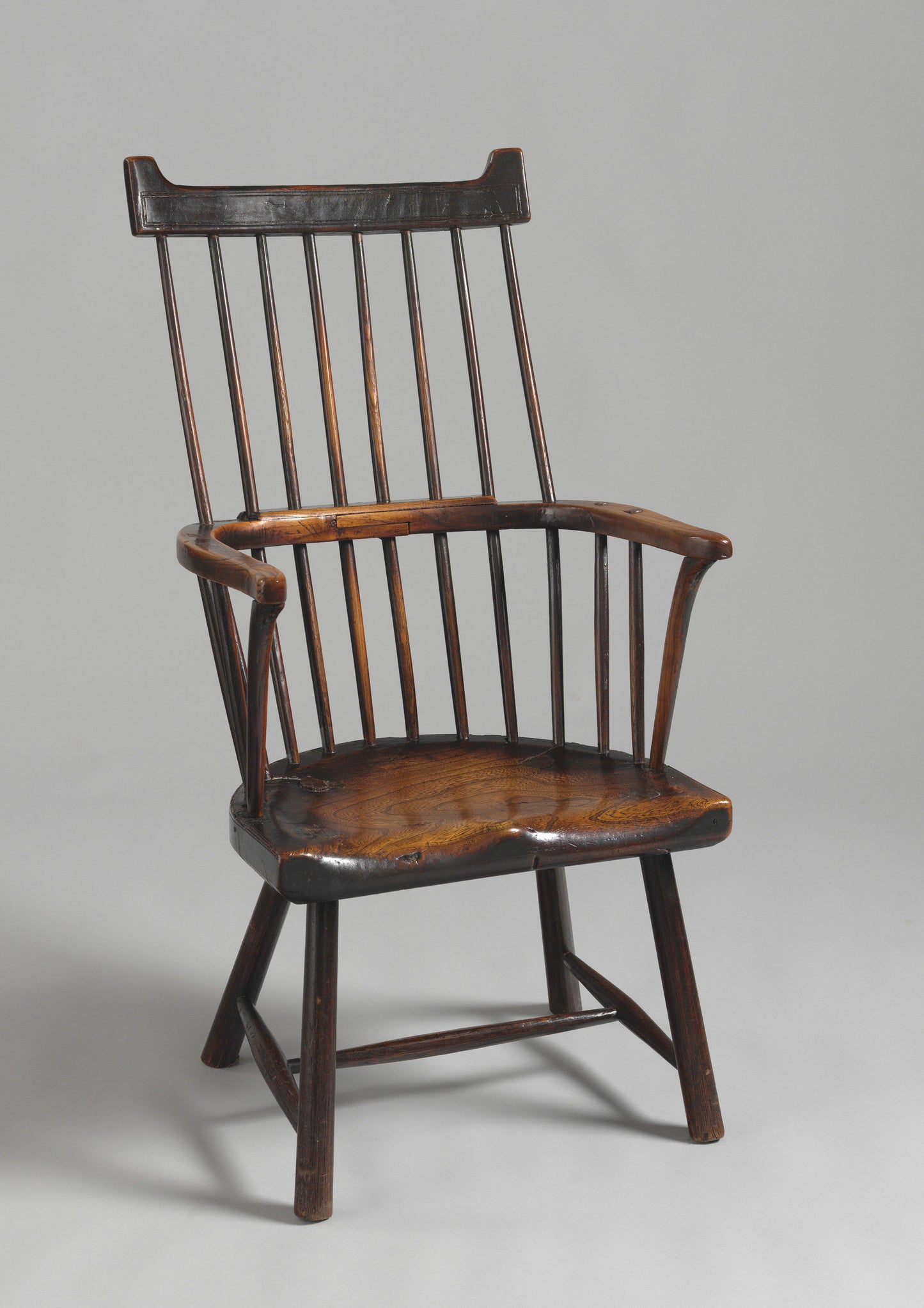 Unusual Primitive Windsor Comb Back Armchair